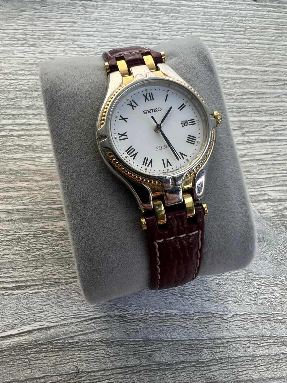 Seiko SQ 50 Silver and Gold Case Watch with White Dial and Leather Strap